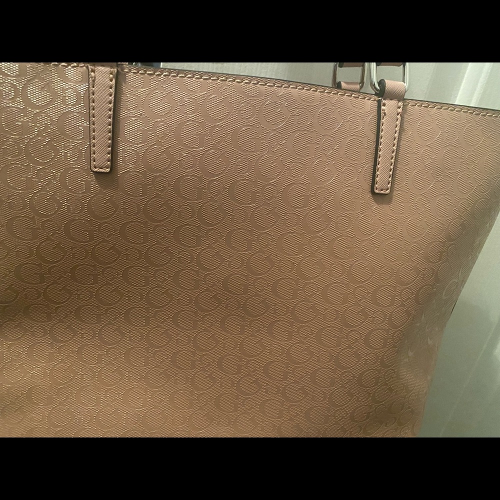 It can fit most laptops in it and good for women that carry a lot of things